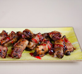 pork mince with bacon wrapped sausages. top view. copy space for text. High quality photo