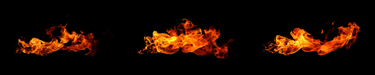 Bright orange fire flames isolated on black background, showing dynamic heat and energy movement. Perfect for design overlay, explosion effect, power, danger, and abstract background use.