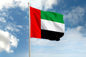United Arab Emirates flag waving proudly in a bright blue sky, showcasing detailed fabric texture, smooth motion, and realistic lighting symbolizing national pride and unity.