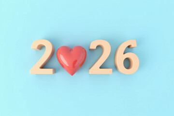 2026 New year for healthcare concept. A red heart and the numbers 2026 arranged horizontally on a light blue background. health insurance. Mental Wellness. medical. New year resolutions goal.