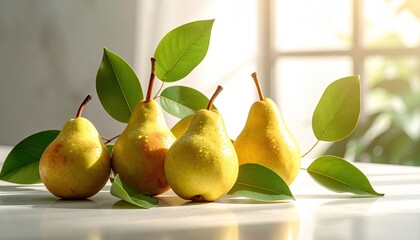 Group of Fresh Ripe Yellow Pears with Green Leaves and Water Droplets Bathed in Soft Sunlight on a White Surface with Blurred Window Background