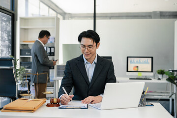 Business people and lawyers discussing contract papers sitting in the table at office in the morning. concepts of law, advice, legal services.