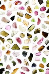 Tourmaline rare jewel stones texture on white light isolated background