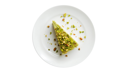 Green Pistachio Cake Slice Topped with Whole and Chopped Nuts