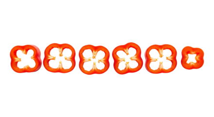 Red pepper slices are aligned horizontally, showing their hollow interiors against a isolated background.