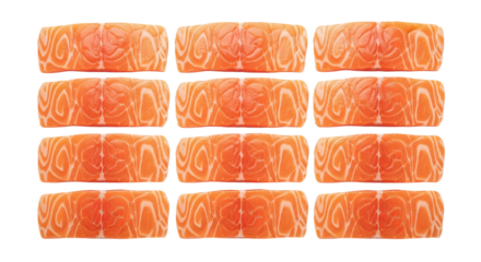 Salmon fillets display natural marbling with a bright orange hue arranged neatly on a flat surface.