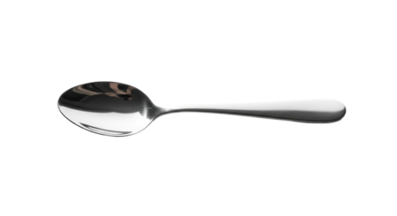 A polished metal spoon lays horizontally on a stark, background, reflecting light.