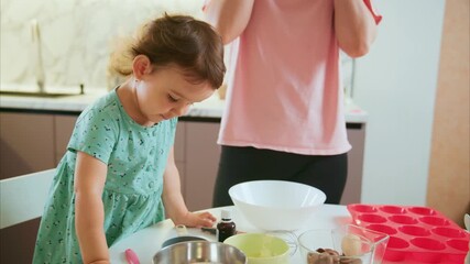 Joyful Learning in the Kitchen: A Child's Culinary Adventure with Mom, Mixing Ingredients and Sharing Laughs in a Family Bonding Moment - Powered by Adobe