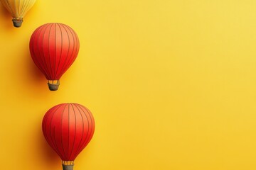 Obraz premium Colorful hot air balloons floating against a bright yellow background in a cheerful display