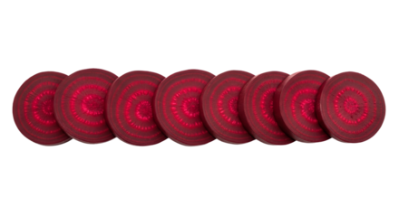 Beetroot slices are arranged horizontally, displaying their concentric rings against a isolated background.