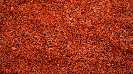 Gochugaru, dry chili powder, Korean organic hot chili pepper, textured background