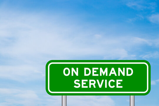 Green color transportation sign with word on demand service on blue sky with white cloud background