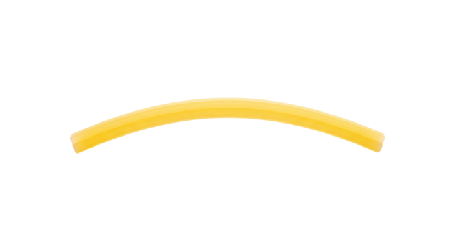 Curved yellow object appears centered against a stark background, exhibiting uniform illumination.