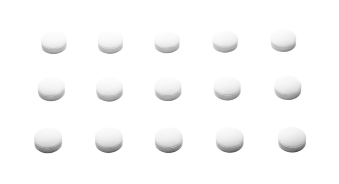 Fifteen pills are arranged in a grid pattern on a plain surface. - high quality Fifteen pills are arranged in a grid pattern on a plain surface.