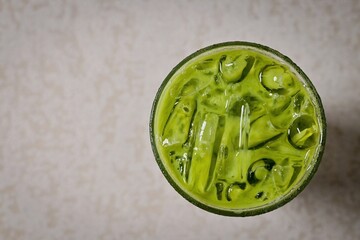 Iced milk green tea top view food table	