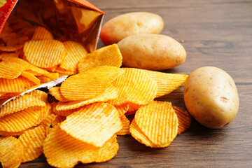 Potato chips , delicious BBQ seasoning spicy for crips, thin slice deep fried snack fast food.