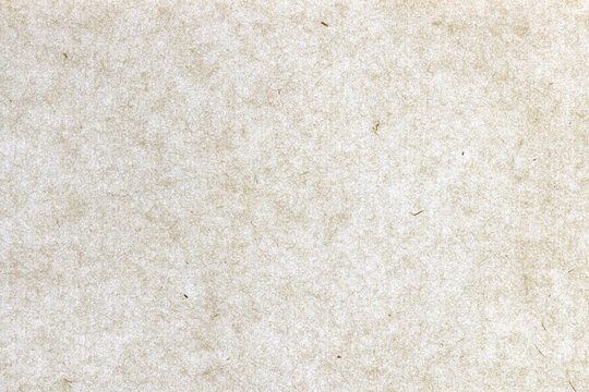 Thin silk hairs kraft decorated paper background. Plant fibers decorative paper texture. Landscape horizontal orientation.