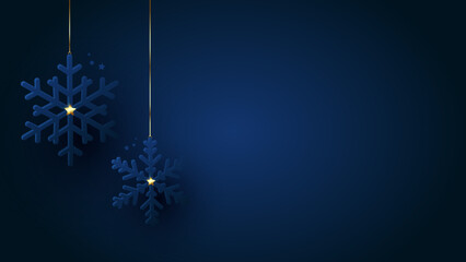 Christmas decorations. Blue snowflakes decorated gold shining stars. Navy winter background