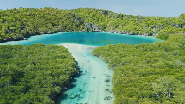 Aerial view of the blue lake in Indonesia. The Nirwana lake, Telaga Nirwana, located on Rote island in Indonesia