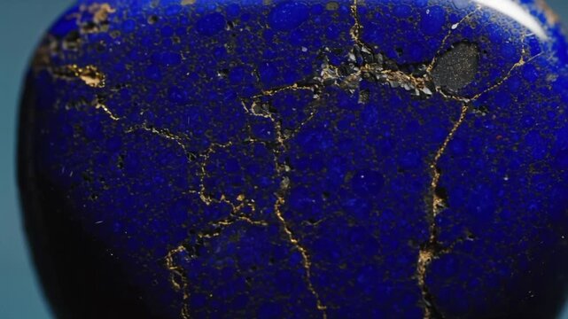 Lapis lazuli gemstone close-up showing patterns