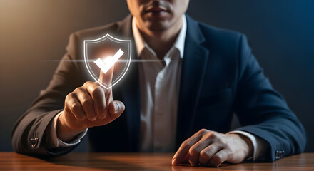 Professional Man Activates Glowing Shield Icon for Digital Security