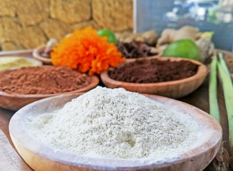 Nature spa spices placed on the wooden plates in close up