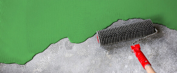 The concrete floor is emerald painted. Contractor will paint garage floor to accelerate home sale