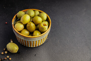 Green olives pickled seedless natural product tasty snack fresh delicious gourmet food background...