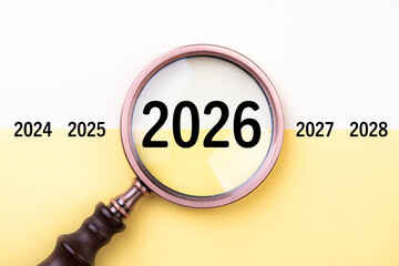 2026 New Year card. New Years goals 2026 with magnifying glass, target icon. Concept 2026 New Year background. Business, resolutions, goals, inspiration, financial, success, ideas