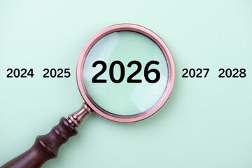 2026 New Year card. New Years goals 2026 with magnifying glass, target icon. Concept 2026 New Year background. Business, resolutions, goals, inspiration, financial, success, ideas
