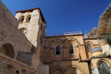 Church of the Holy Sepulchre and famous Status Quo ladder. Landmark of Holy Land. Christianity pilgrimage site in Jerusalem, Israel.