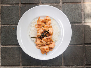 A plate of homemade Japanese Chicken Karaage served with Mentai sauce and white rice