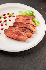 Duck breast roast poultry fresh natural product tasty snack delicious gourmet food background on the table rustic top view copy space