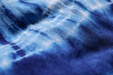 Blue Tie-dye Textile pattern, macro shot of indigo shibori fabric Texture