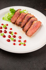 Duck breast roast poultry fresh natural product tasty snack delicious gourmet food background on the table rustic top view copy space