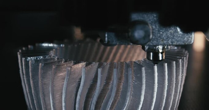 3D printer working. Fused deposition modeling, FDM. 3D printer printing an object from plastic. Automatic three dimensional 3d printer performs plastic. Progressive additive technology for 3d printing