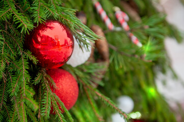 Festive pine tree decoration captured with a cozy background. Christmas background