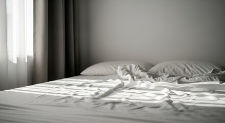 Sunlight Shadows Cast Across a White Rumpled Bed in a Quiet Room