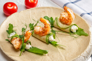 Delicious shrimp tacos served on fresh tortillas with greens and a creamy filling, perfect for a summer meal