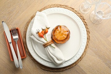 Beautiful table setting with autumn decor on wooden background, flat lay