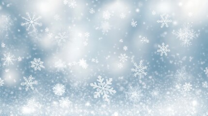 Fototapeta premium A serene winter scene featuring delicate snowflakes gently falling against a soft blue background, creating a tranquil and magical atmosphere.