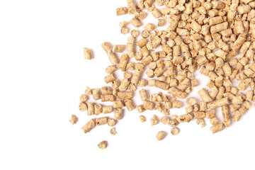 Wood pellets falling randomly. Used as cat litter or bio pellets or fuel pellets for heating in stoves or furnaces. Natural alternative to clay litter. Pressed pine or softwood. Selective focus.
