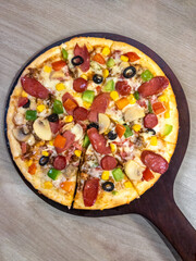 Vibrant Top Shot of a Whole Pizza with Colorful Toppings