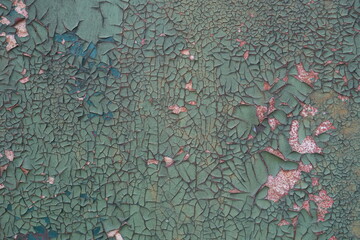 Full Frame Close-up of Fine Cracks and Peeling Green Paint Texture
