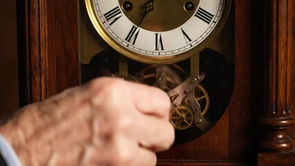Close up of antique clock with hand adjusting gears time concept - Powered by Adobe