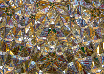 Intricate geometric mosaic reflects colorful patterns