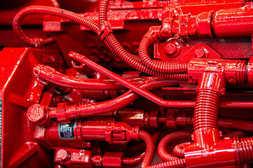 The red engine is covered in red paint