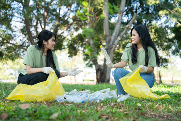 Volunteers show social responsibility by working together to recycle plastic, creating friendly community. Their teamwork help support sustainable environment for future generations. Volunteer concept