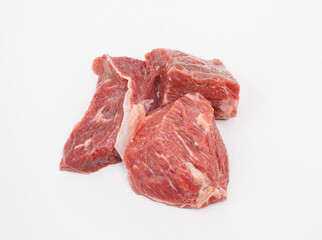 Raw Beef Chunks on White Background for Kitchen, Butchery, and Cooking Imagery