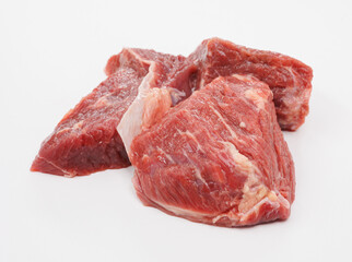 Raw Beef Chunks on White Background for Kitchen, Butchery, and Cooking Imagery